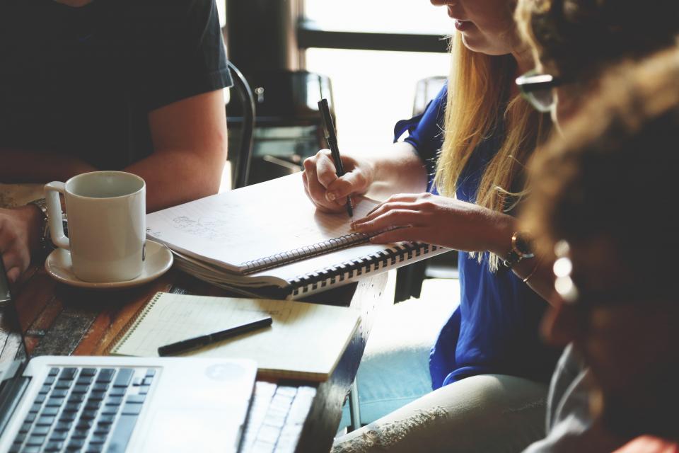 Entrepreneurs working together around a table
