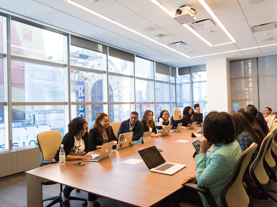 Entrepreneurs working together around a table